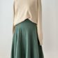 Knit skirt merino wool, pleated mid-length in dark green – Erica